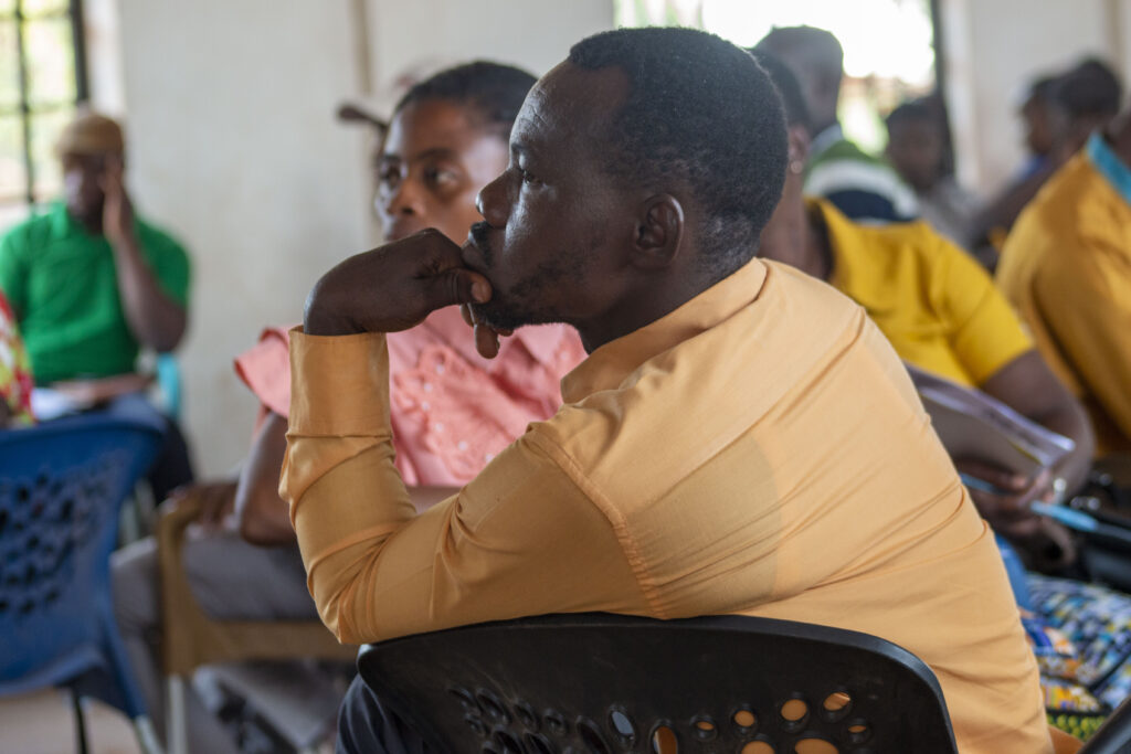 Teacher listens in attentively on how the class is run